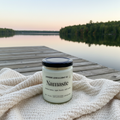 Namaste candle on soft blanket